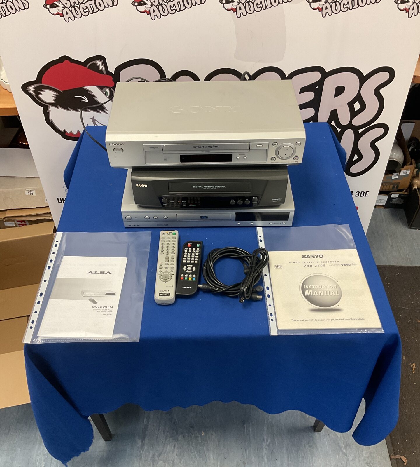 Vintage Alba DVD player with remote control for home entertainment.