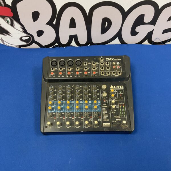 Alto Professional ZMX 122FX audio mixer with multiple channels and controls.