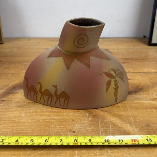 German Amano camel vase with repeating animal design.