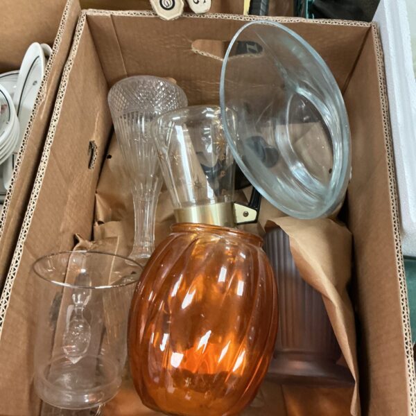Vintage amber glass vase with a bulbous shape.
