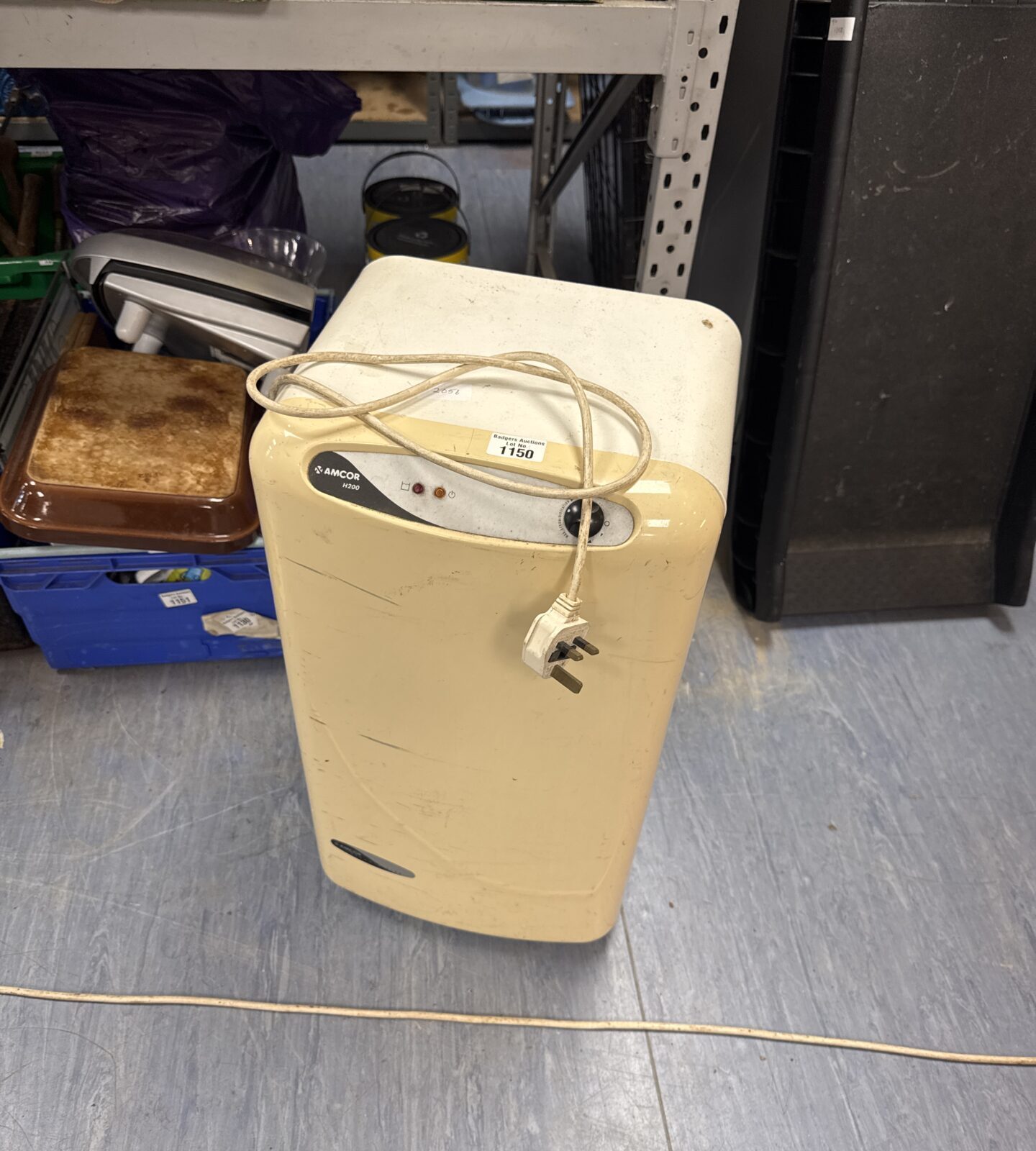 Used Amcor H200 dehumidifier for moisture removal in homes.