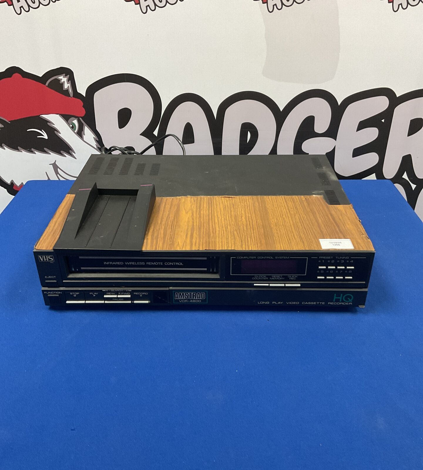 Front view of a vintage Amstrad VCR-4600 video cassette recorder.