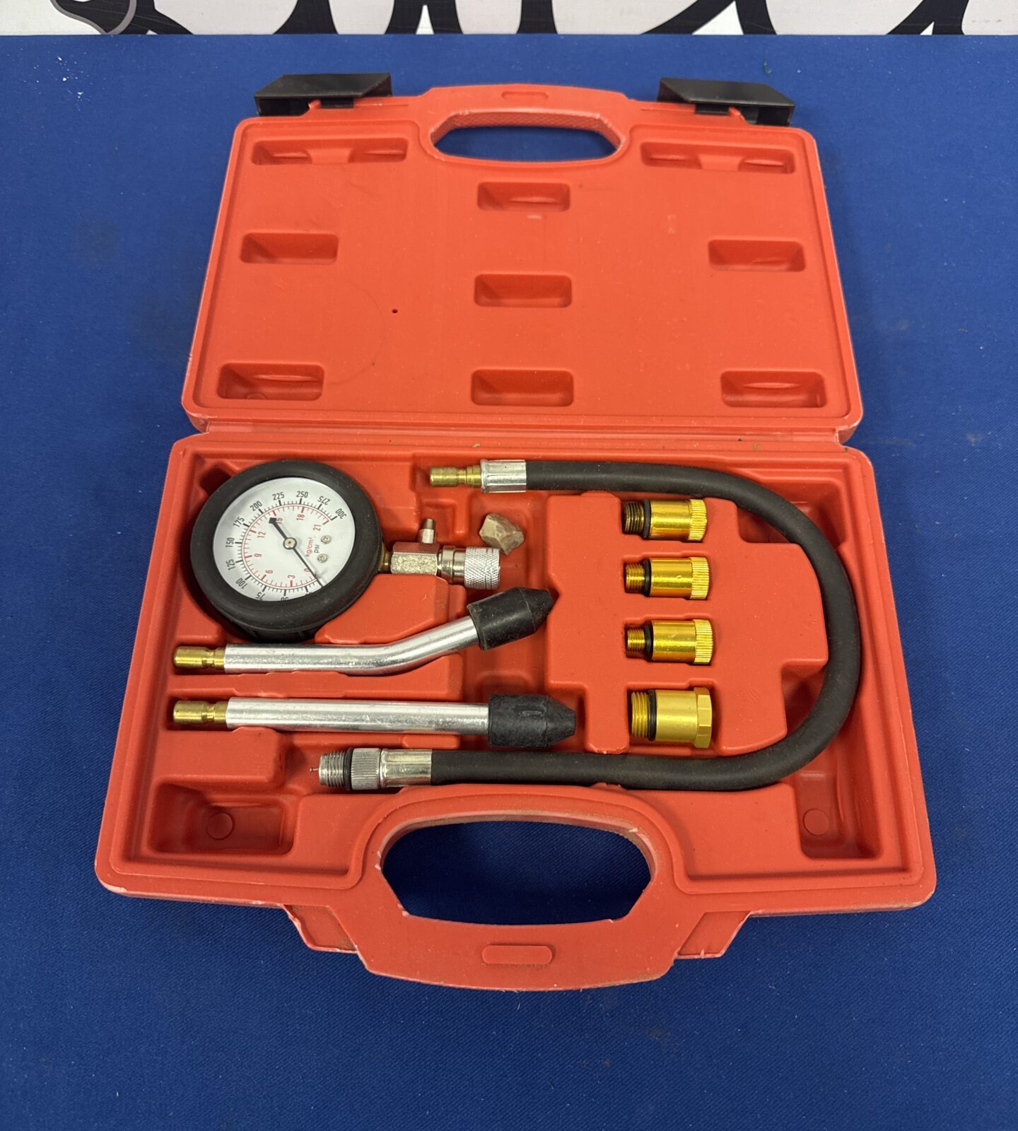 Amtech engine compression tester kit with gauge and adaptors.