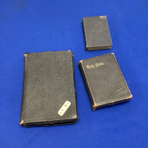 Antique lot of bibles and hymn book, vintage religious literature.