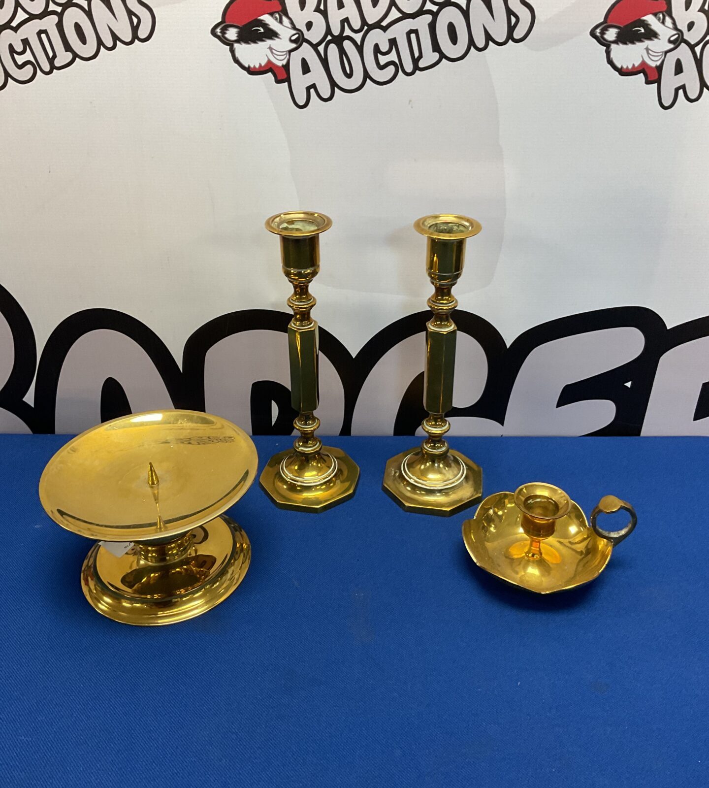 Antique brass candlesticks and chamber stick set for vintage home decor.