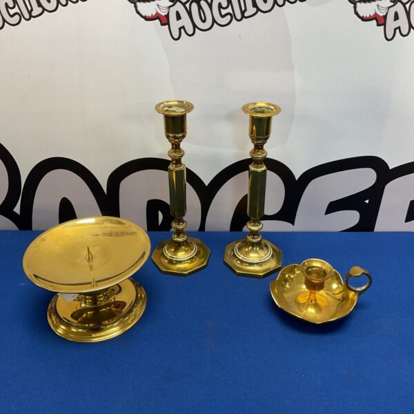 Antique brass candlesticks and chamber stick set for vintage home decor.