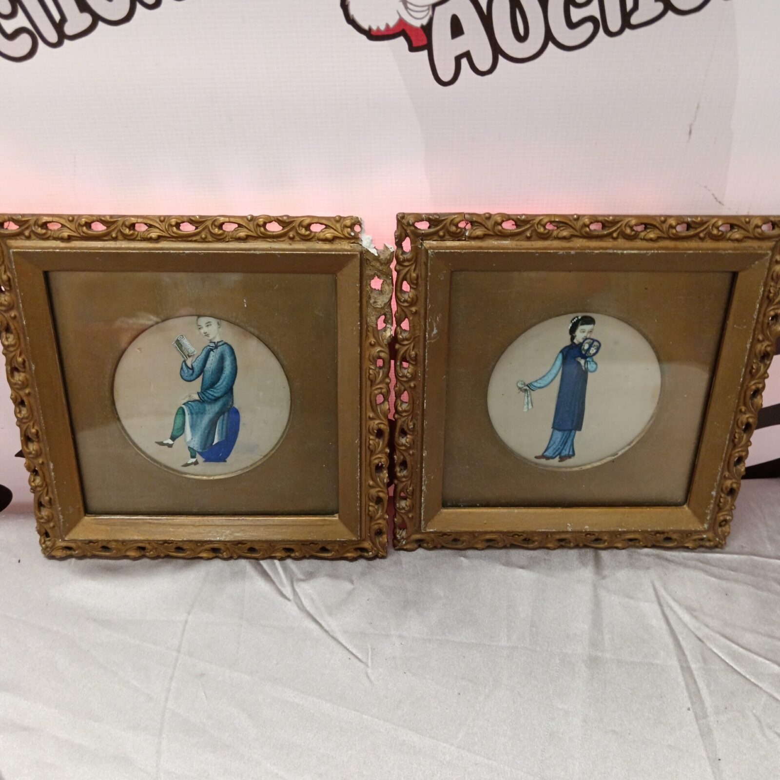 Pair of antique Chinese silk paintings with ornate frames.