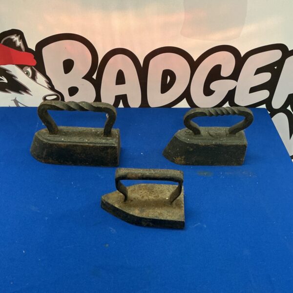 Antique flat irons lot, vintage cast iron ironing tools.