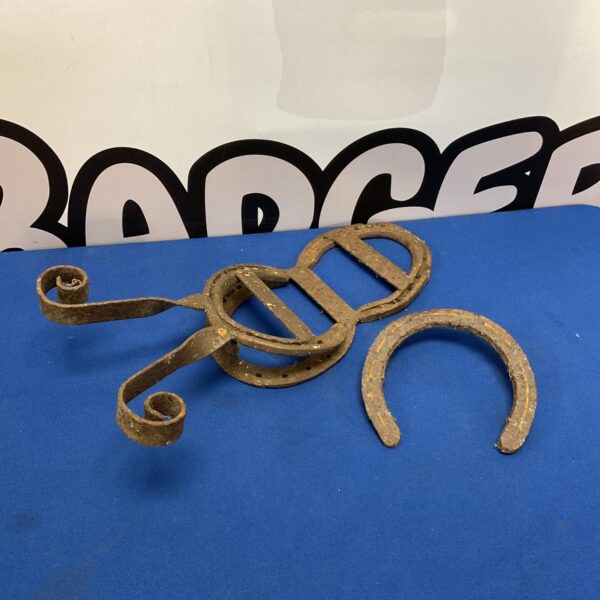 Antique horse shoe boot remover tool for equine hoof care.
