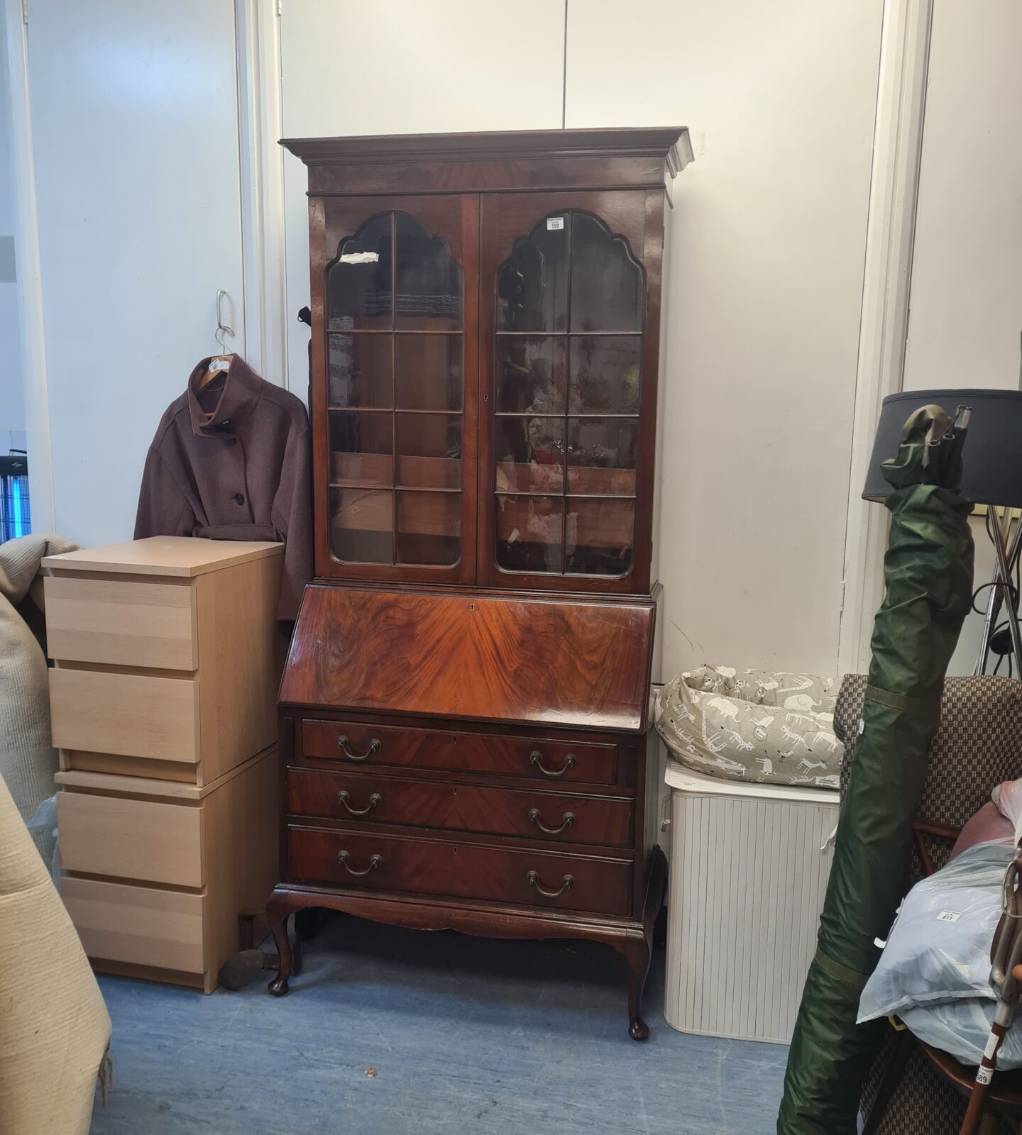 Front view of antique mahogany bureau bookcase with glazed cabinets.