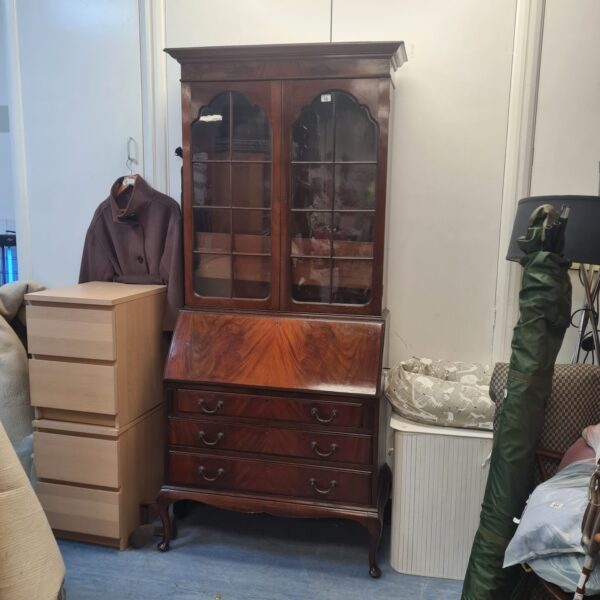 Front view of antique mahogany bureau bookcase with glazed cabinets.