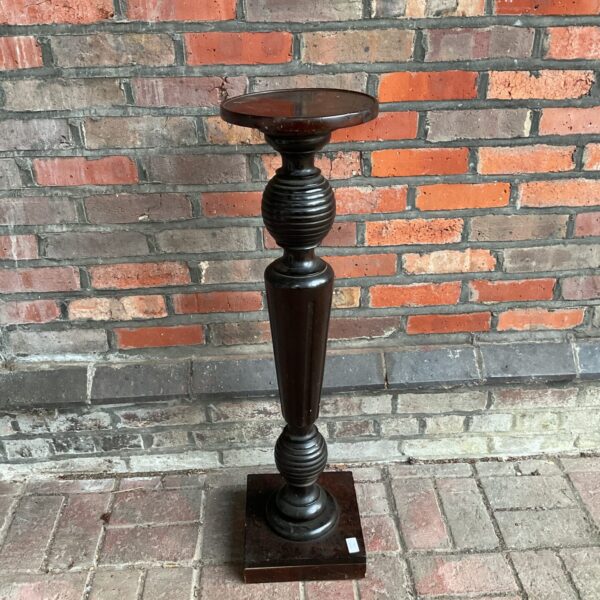 Antique mahogany jardiniere stand with fluted column and square base.