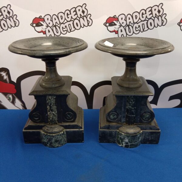 Antique marble garniture pair with dark marble and white veining.