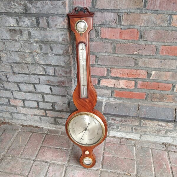 Antique Victorian mercury wall barometer for weather forecasting.