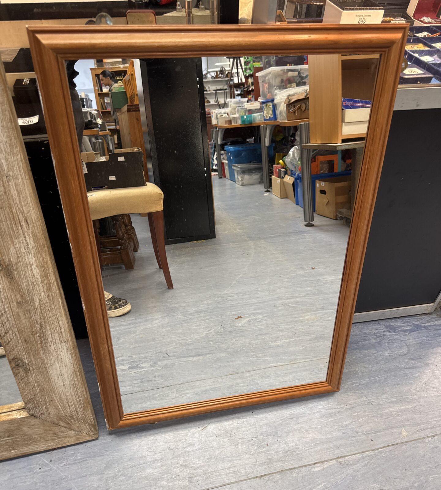Vintage brown framed mirror with bevelled glass.