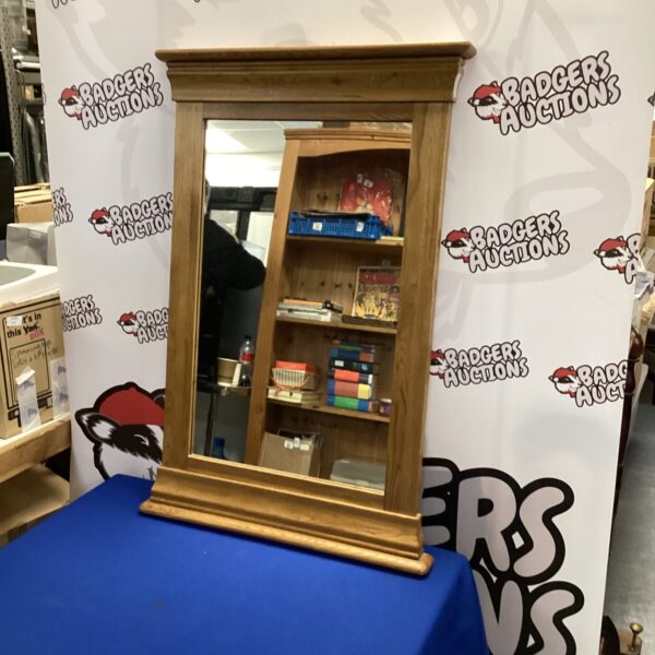 Antique oak framed mirror with bevelled glass, vintage home decor.