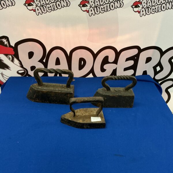 Lot of three antique smoothing irons for collectors.