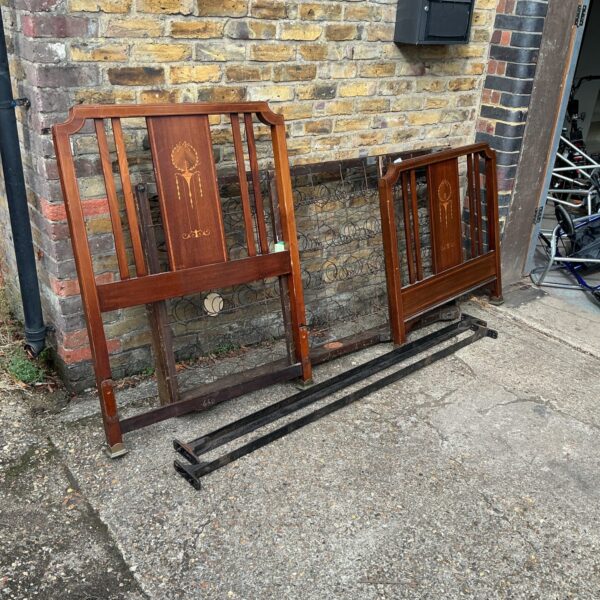 Antique Staples and Co bedstead with wire mattress, Victorian era.