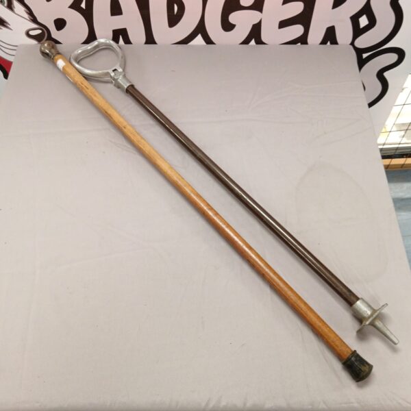 Antique sterling silver ramble shooting stick with wooden shaft.