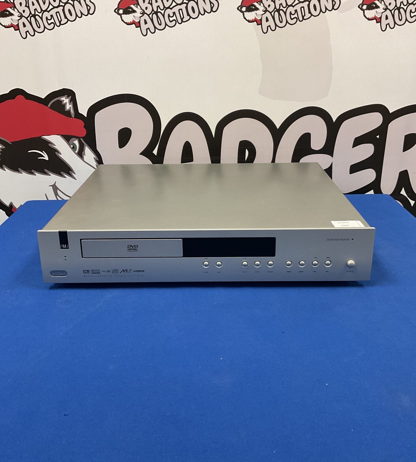 Arcam FMJ DV29 DVD player in silver, front view.
