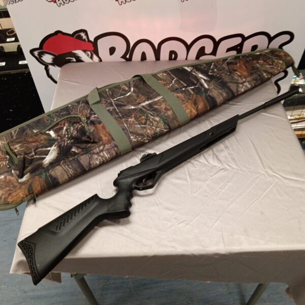 Camouflaged Armskon .177 caliber break barrel air rifle with case.