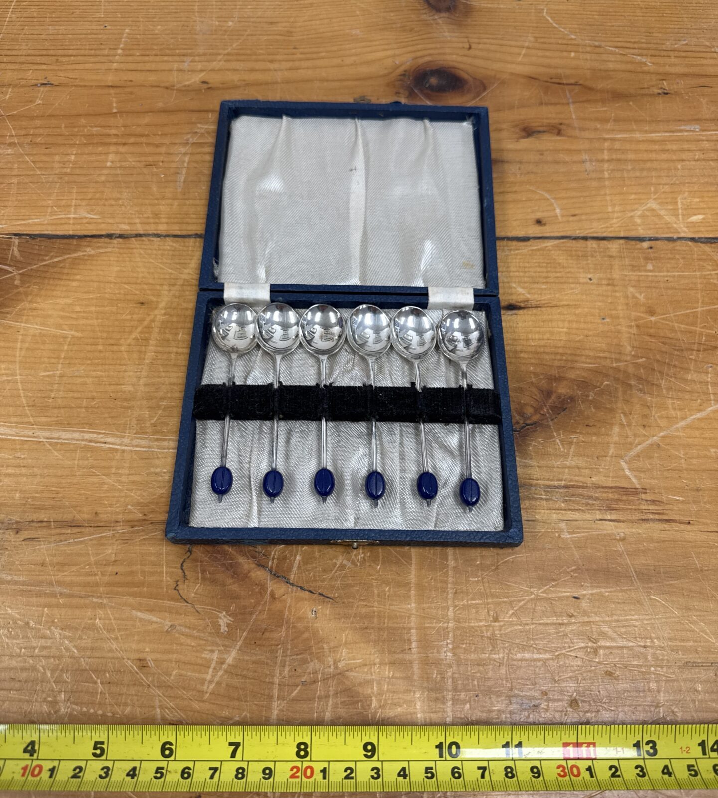Vintage Art Deco silver plated coffee spoon set with blue beads.