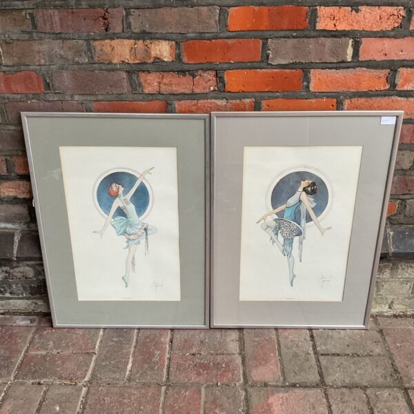 Pair of vintage Art Deco flapper prints in ornate frames.