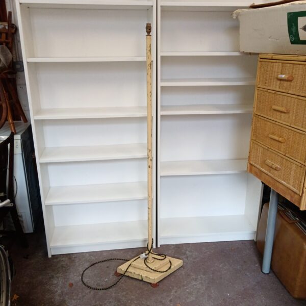 Vintage Art Deco floor lamp with a slender metal stand.
