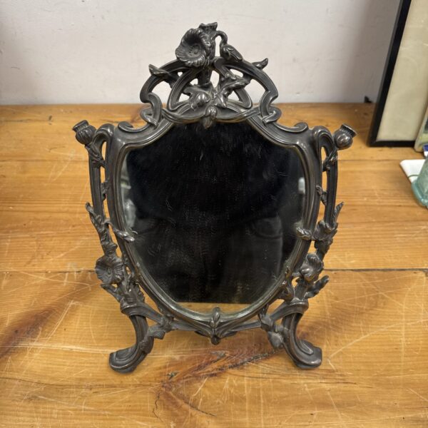 Antique Art Nouveau Scottish pewter easel mirror with floral details.