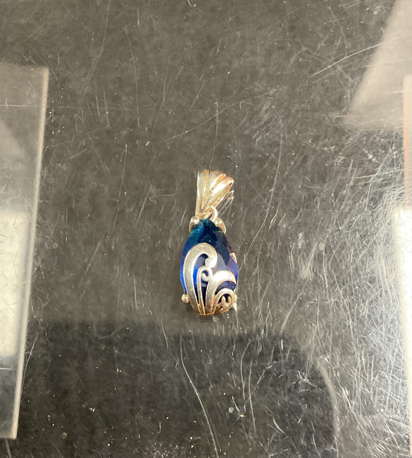 Stunning Art Nouveau silver pendant with a blue stone.