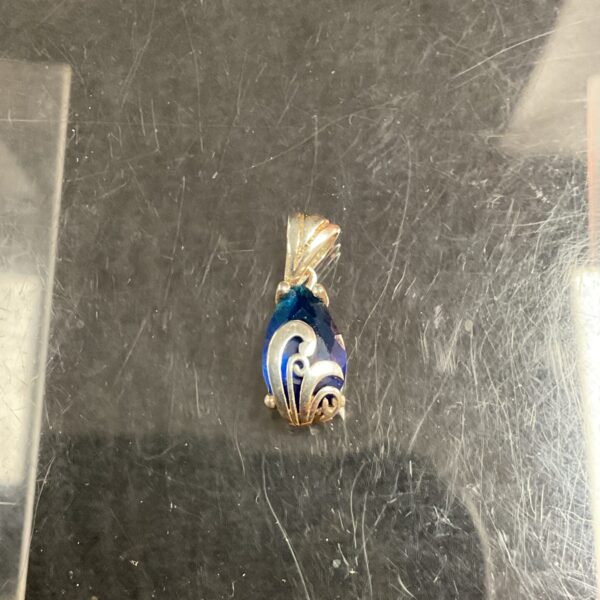Stunning Art Nouveau silver pendant with a blue stone.