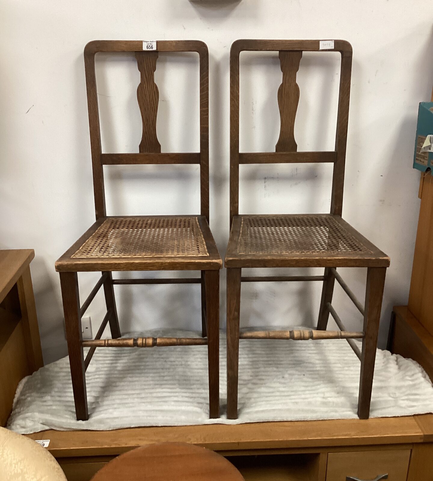 Pair of antique Arts and Crafts chairs with cane seats.