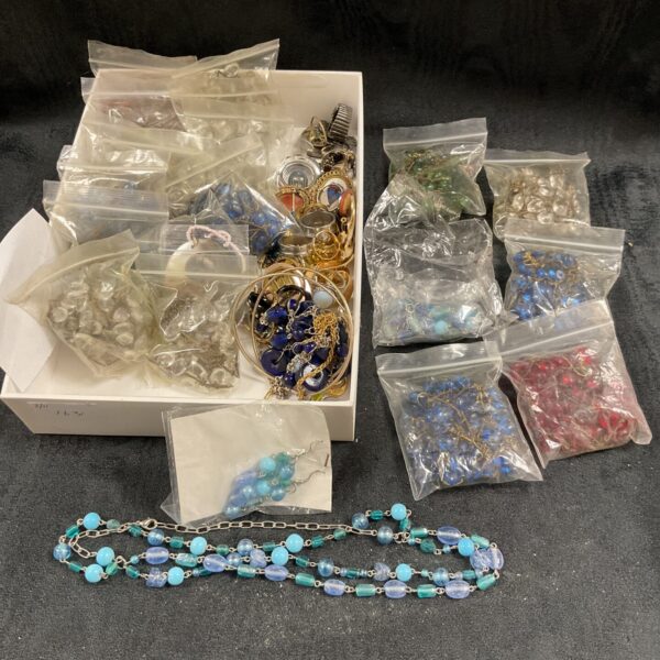 Large lot of assorted costume jewellery with bagged sets.