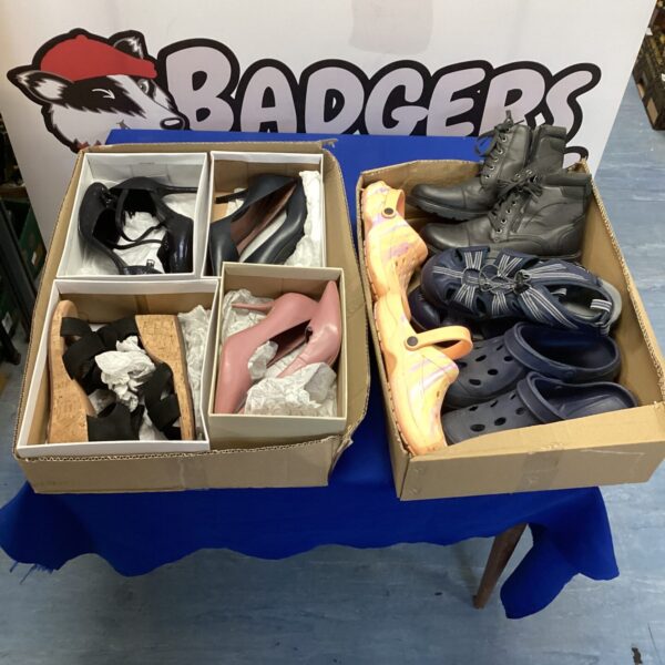 Assorted footwear lot in two boxes, mixed styles and sizes.