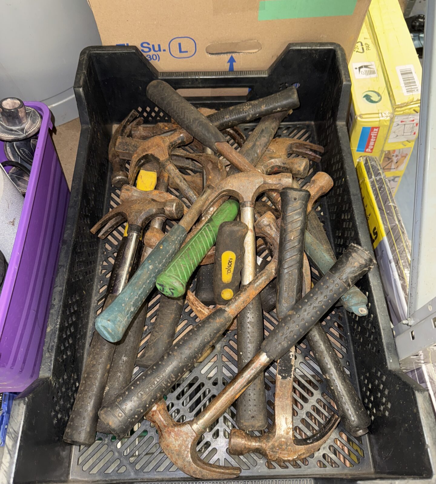 Assorted vintage hammers in a quantity lot for DIY projects.
