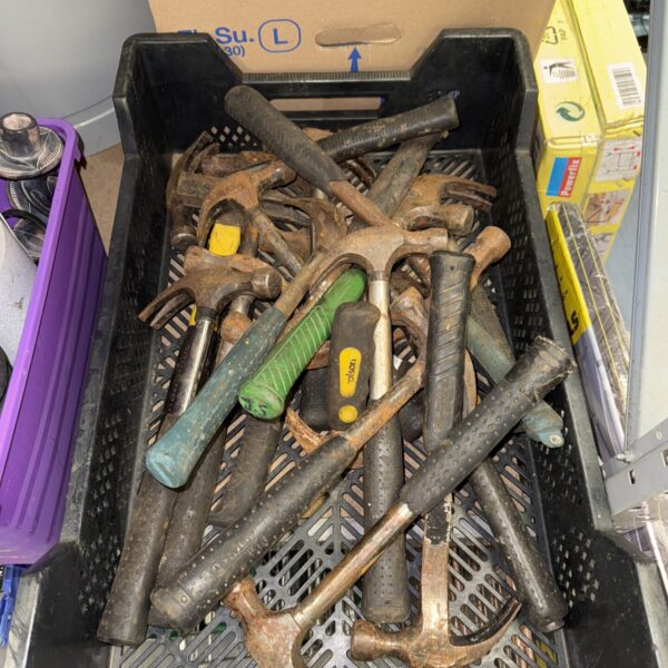 Assorted vintage hammers in a quantity lot for DIY projects.