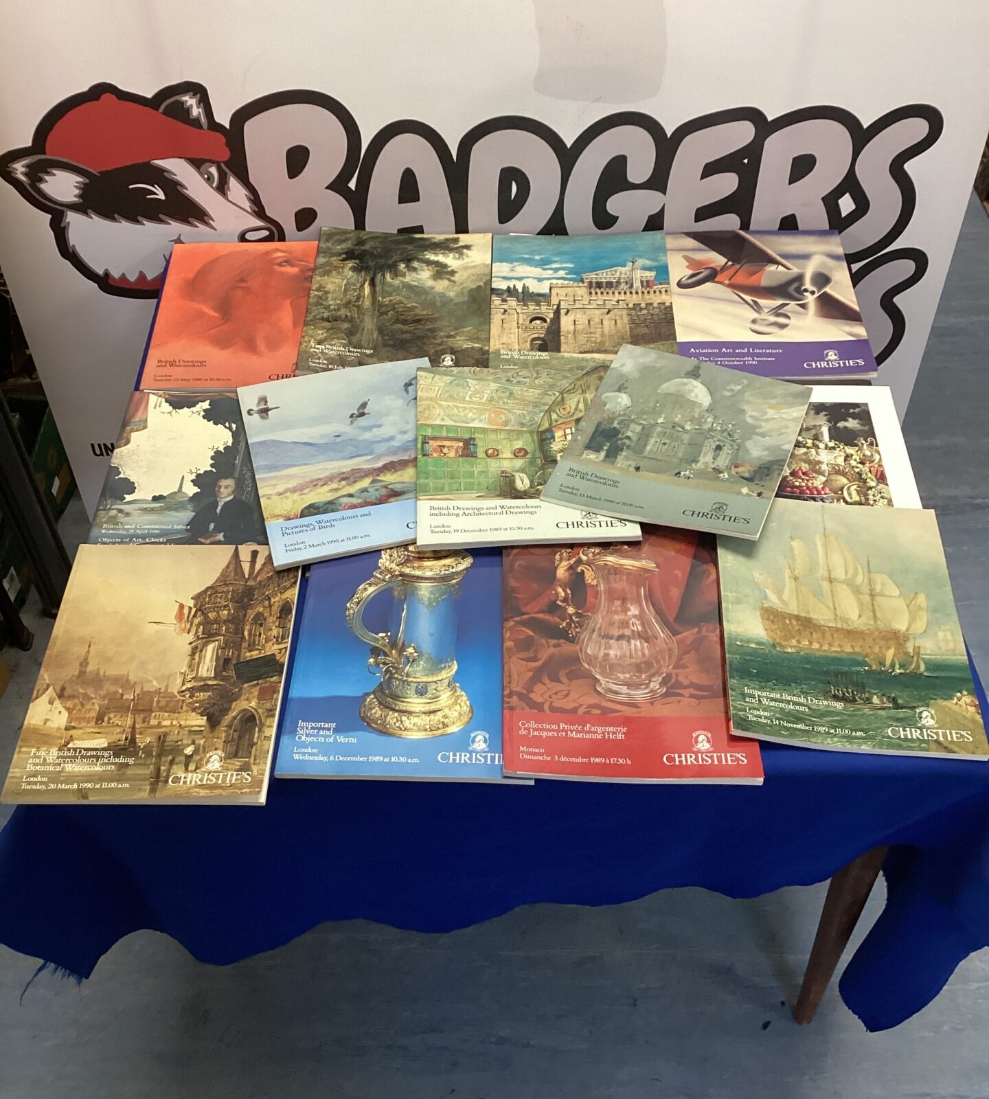 Lot of auction price guides for art and silverware collectibles.
