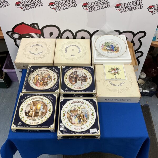 Collection of Aynsley and Royal Worcester Christmas collectible plates.
