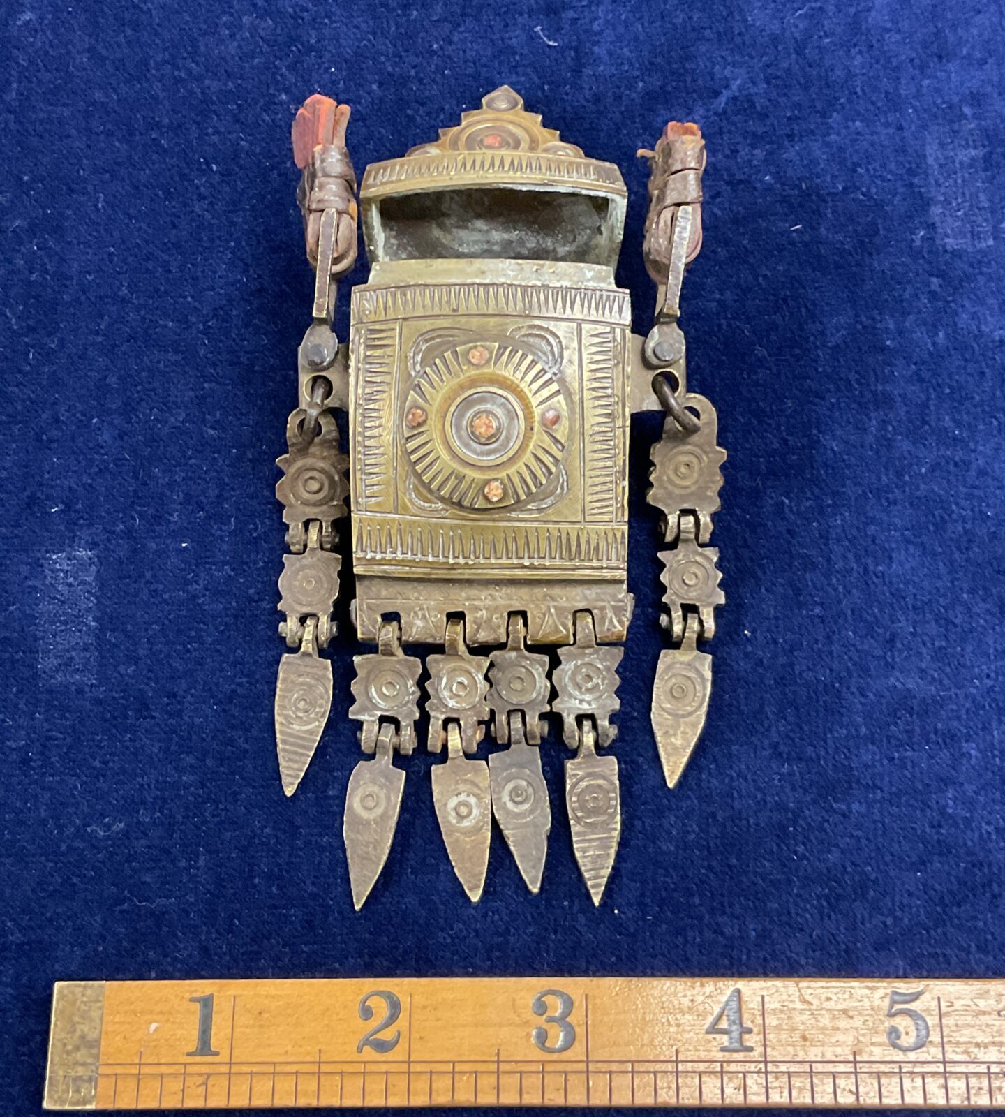 Side view of antique Balkan gunpowder box with ruler.