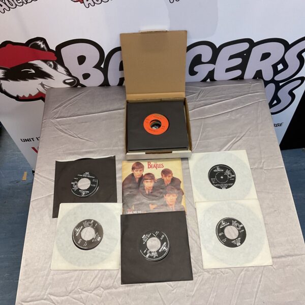 Vintage Beatles 7 inch singles lot for collectors.