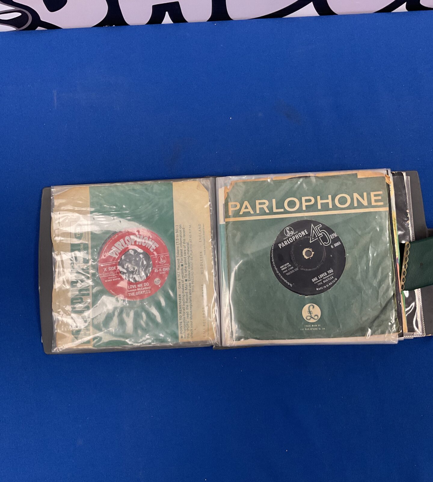 Vintage Beatles vinyl record in sleeve.