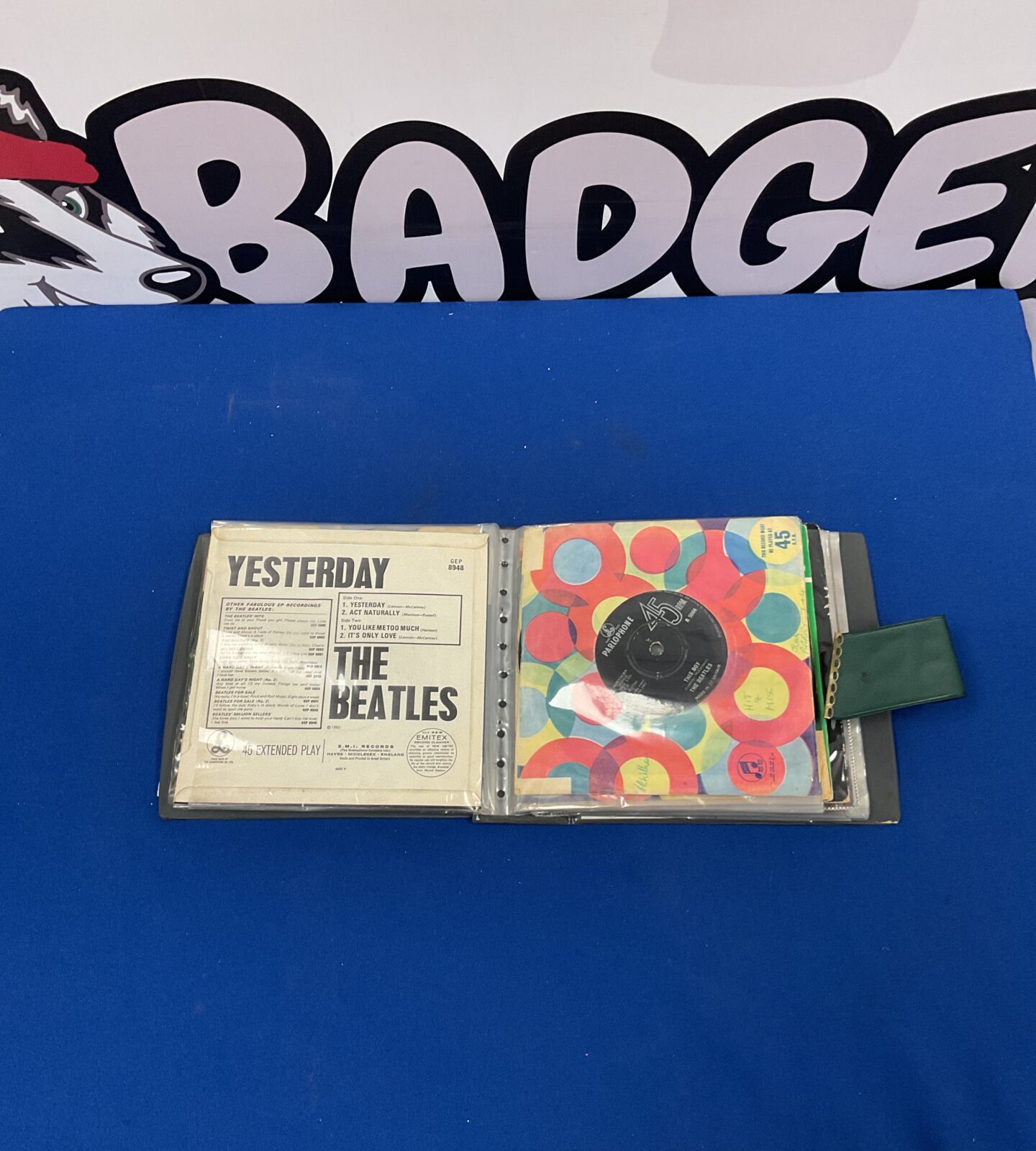 Beatles singles collection in protective sleeves.