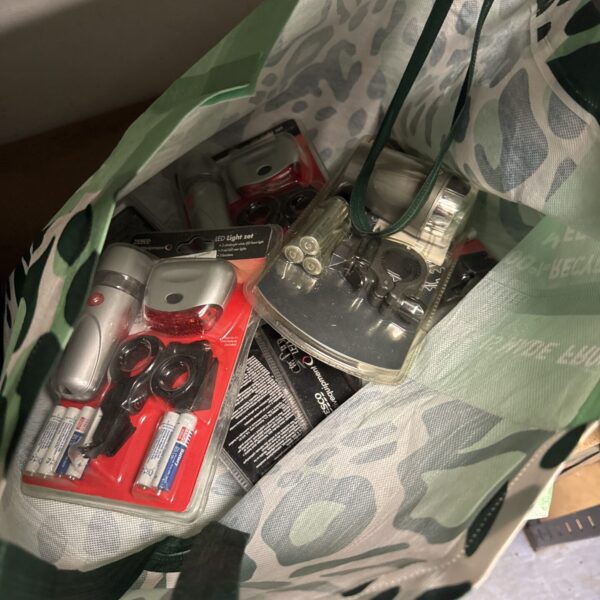 New bicycle lights set in original packaging for cycling safety.