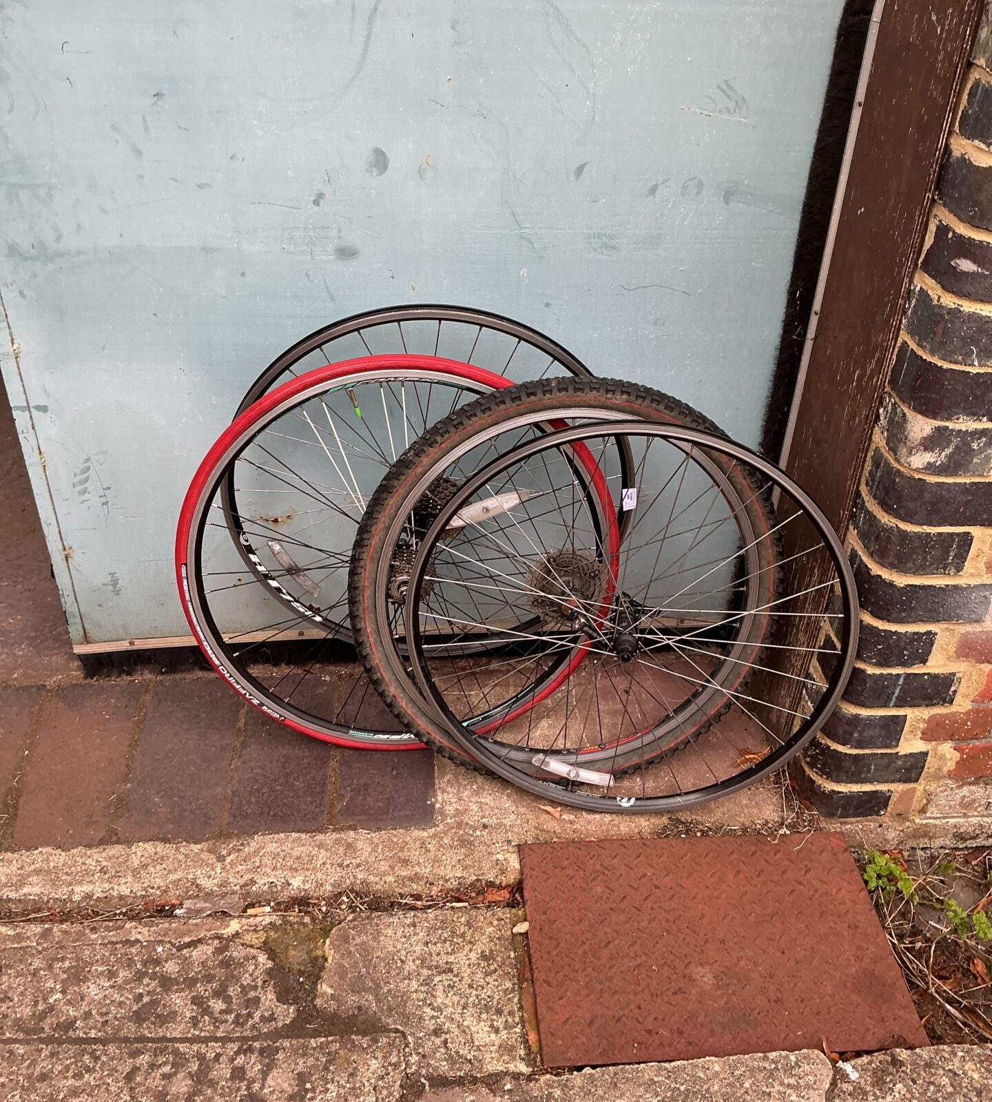 Set of four used bike wheels for cycling.