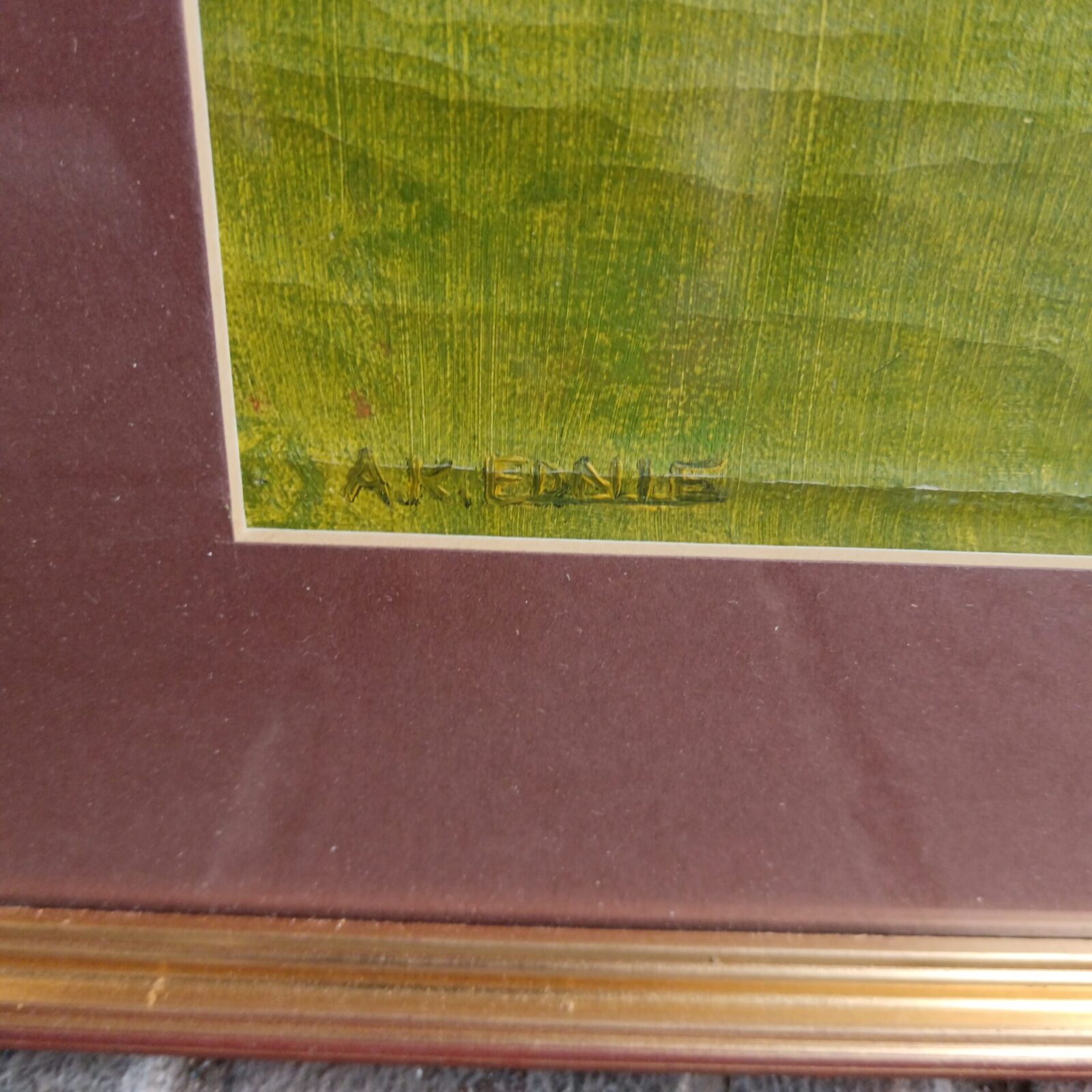 Close-up of bird of paradise painting with signature.