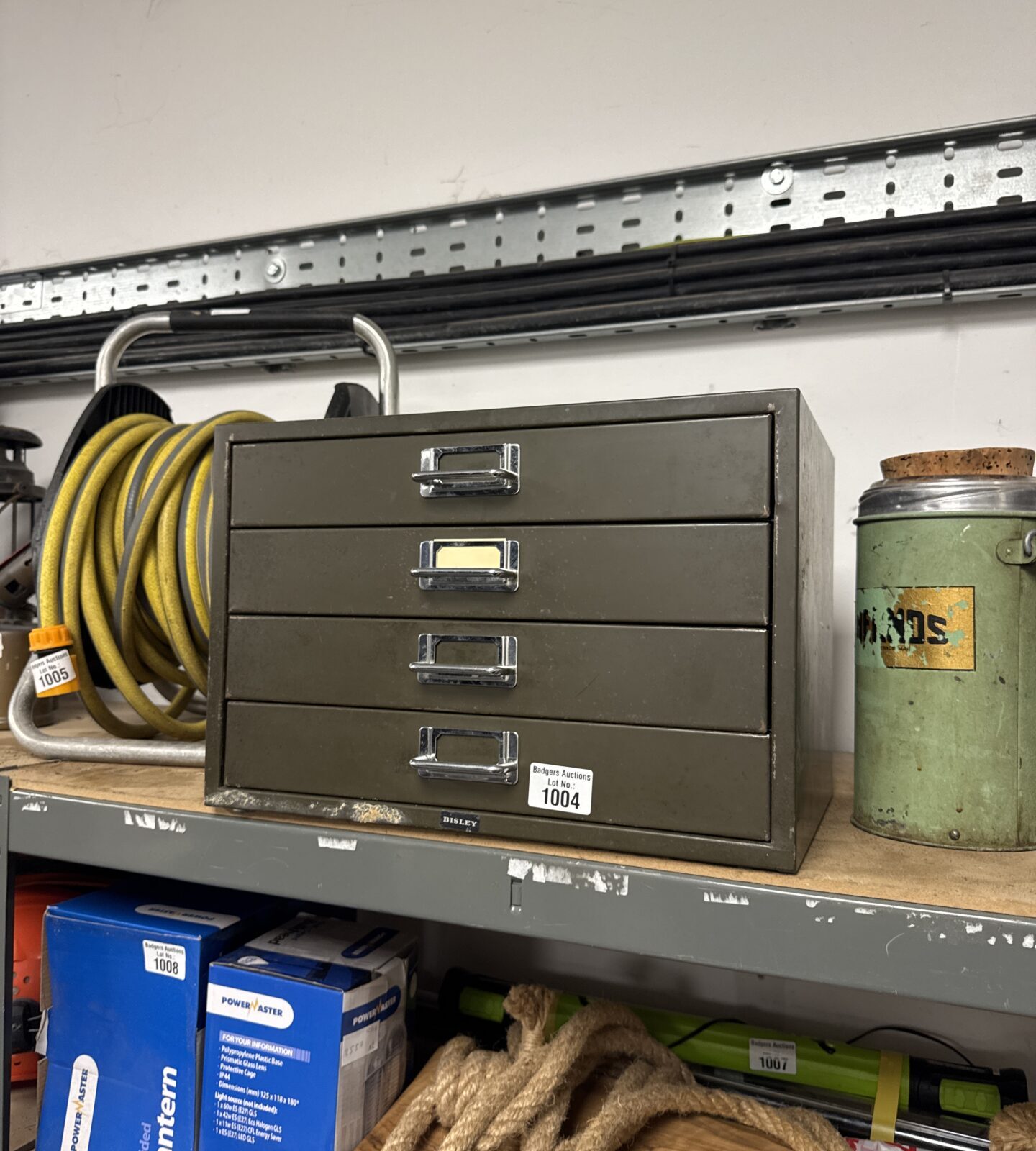 Vintage Bisley filing cabinet on a shelf, metal desk organiser.