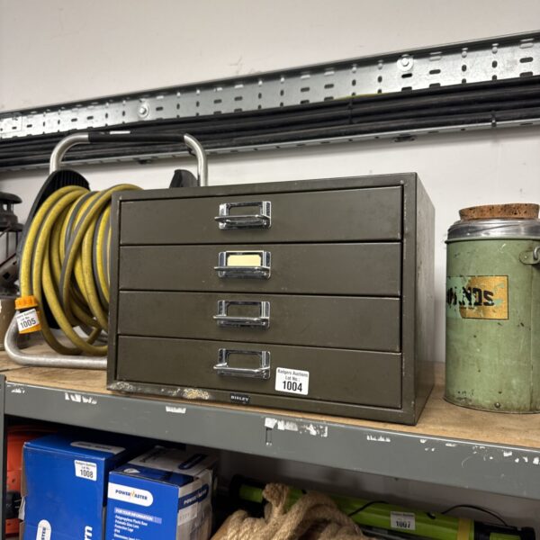Vintage Bisley filing cabinet on a shelf, metal desk organiser.