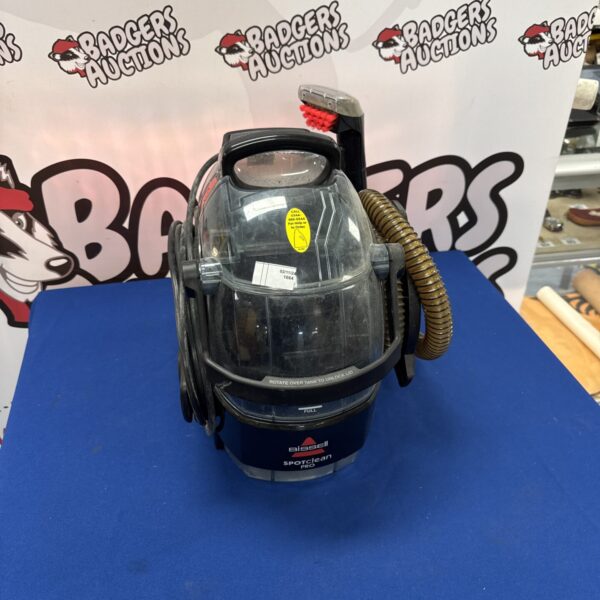 Bissell Spotclean Pro handheld carpet cleaner, portable stain remover.