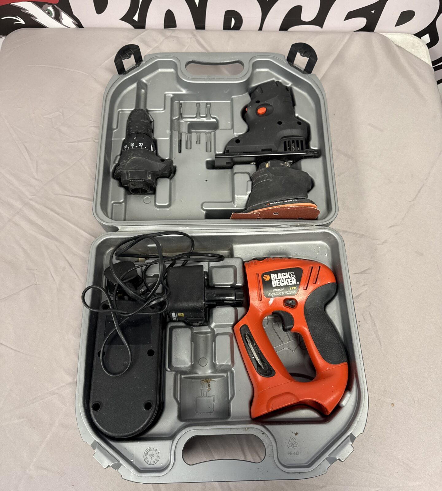 Black & Decker Quattro cordless multi tool in carrying case.