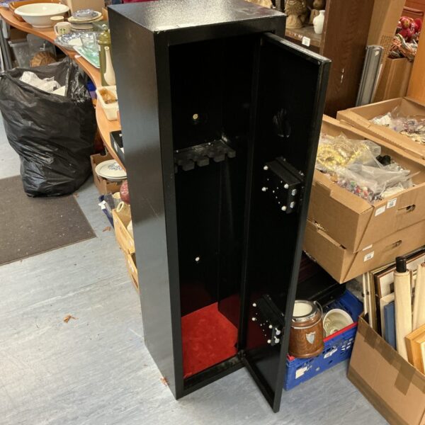 Black metal gun cabinet with open door, showing interior storage.